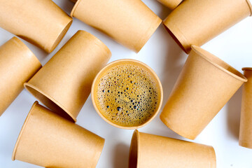 Brown paper cups on white background.