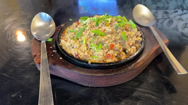 Chicken Sisig, Philippine dish served in a restaurant in Kolkata, India