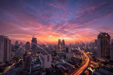 A wide shot of the Bangkok cityscape at sunset, with colorful light trails and digital lines connecting buildings across the horizon,