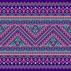 Vibrant pixel tribal pattern in purple, green, and blue tones with bold geometric chevron and ethnic details. Ideal for textile, crafts, and digital design.