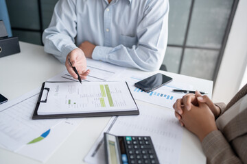 business man Auditor or internal revenue service staff checking annual financial statements company...