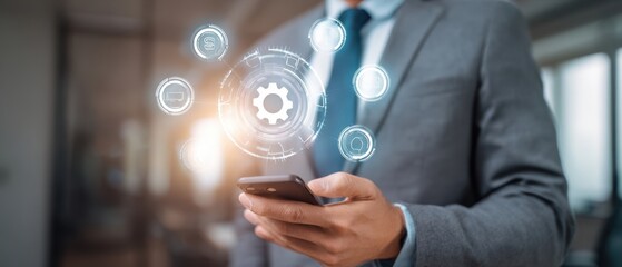 The businessman using a smartphone with digital management icons in the background.