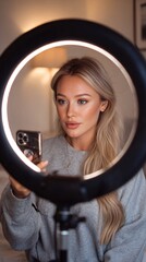 Glamorous Beauty Influencer Filming GRWM Tutorial with Ring Light for Flawless Makeup Look