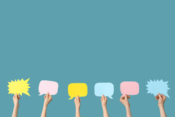 Different hands with speech bubbles on blue background