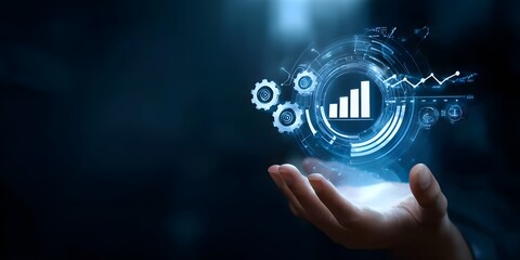 A hand holding digital graphs and gears floating above it, representing the concept of business intelligence or AI technology for data analysis in marketing