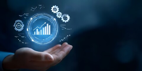 A hand holding digital graphs and gears floating above it, representing the concept of business intelligence or AI technology for data analysis in marketing