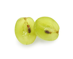 Halves of sweet green grape on white background