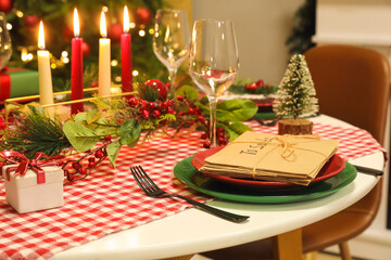 Table setting with Christmas decorations in living room