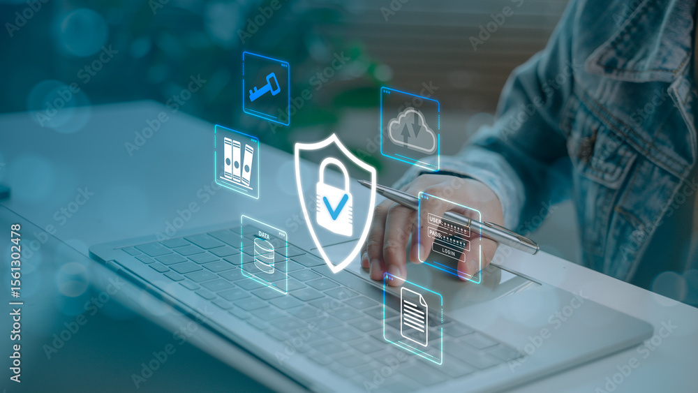Poster close-up of user securing digital data on laptop with cybersecurity icons, including lock shield, pa