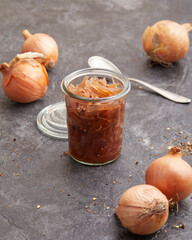 Balsamic pickled onions in a storage jar