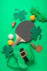 Sports equipment and decorations for St. Patrick's Day celebration on green background