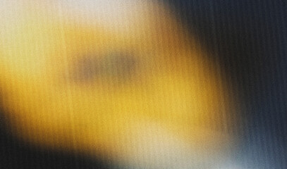 Yellow and black rough abstract background with gradient colors, illuminated bright. Glow template with empty space and textured, grainy noise background.