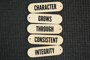 Words or quotes of inspiration and motivation character grows through consistent integrity