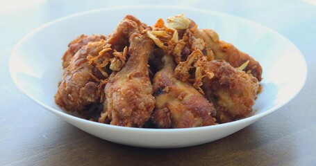 Golden brown fried chicken drumsticks