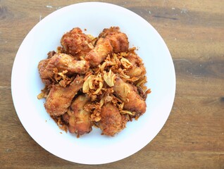 Golden brown fried chicken drumsticks