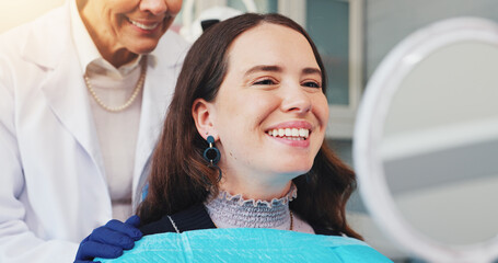 Teeth, smile and mirror with woman at dentist for dental care, treatment and fresh breath....