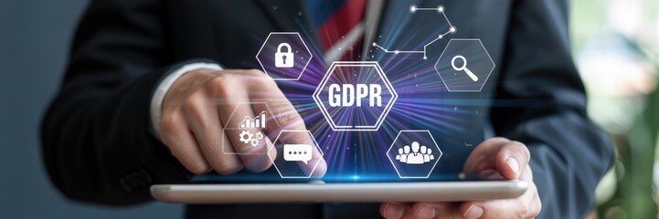 Person using a tablet with gdpr information displayed.