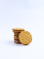 Stack of sandwich cookies with cream and blueberry filling on a white background