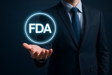 FDA Approval Concept: A professional in a suit presents a glowing FDA seal, representing a mark of quality and regulatory adherence.