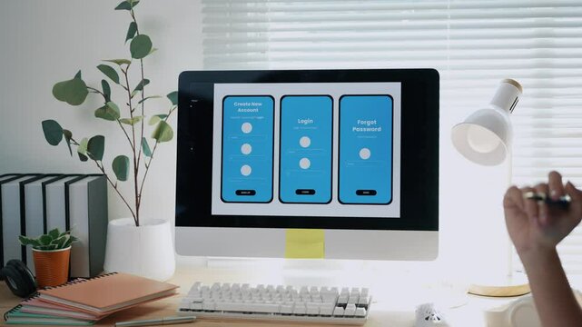 Collaborative programming team developing mobile application user interface, strategizing design workflow in modern tech workspace