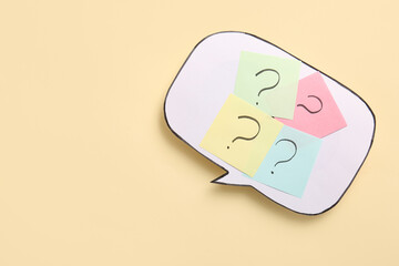 Speech bubble with question marks on color background