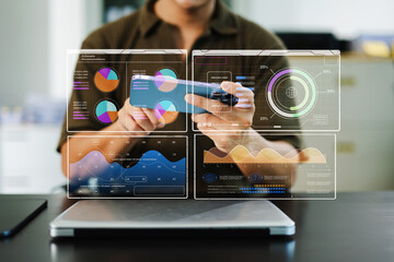 A man analyzing data on a smartphone with futuristic dashboards and charts. Ideal for finance,...