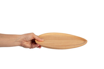 Oval wooden plate in hand on transparent background