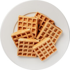 Delicious golden waffles arranged on a white plate, ready to be enjoyed for breakfast.
