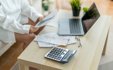 Human use calculator and calculate bills and paying bill, credit card, tax and vat, payment,...