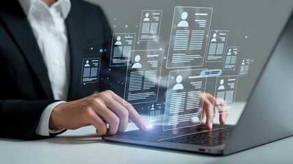 A womans hands hover over a laptop keyboard, with numerous digital resumes floating above, illustrating the modern digital job search and application process