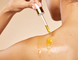 Woman applying nourishing oil to her skin using a glass eye dropper. 
