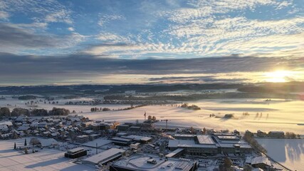 cloudy sunrise in winter landscape. relaxed drone shot by dji mavic air 3s.