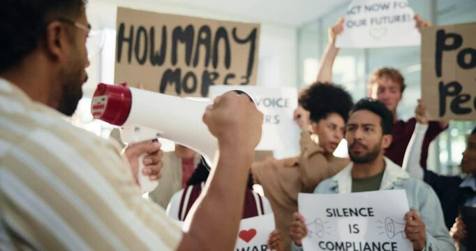 Protest, speaker and group of people for peace, justice and demonstration with posters to stop war. Freedom, shouting and men with women together with bullhorn for change, revolution and movement