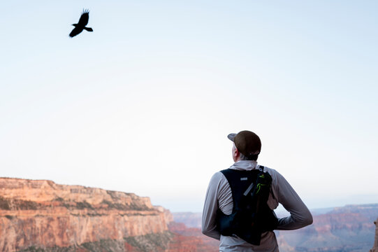 White male in his early 50s runs the Grand Canyon.
