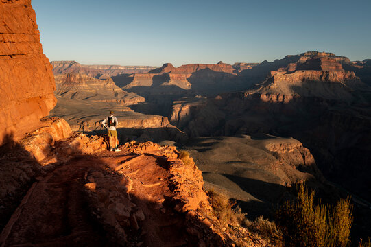 White male in his early 50s runs the Grand Canyon.