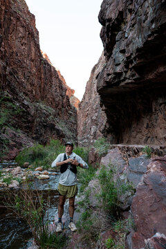 White male in his early 50s runs the Grand Canyon.