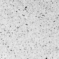Obraz premium Abstract textured surface of speckled gray and white