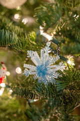 Festive holiday decorations featuring cozy Christmas lights, ornaments, and pine branches creating a warm, nostalgic winter ambiance perfect for seasonal celebrations and winter-themed visuals.