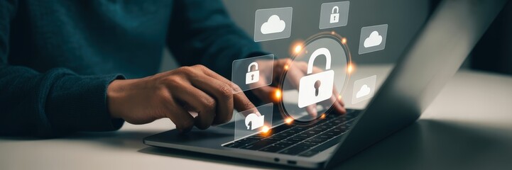 Person working on a laptop with security icons overlay.