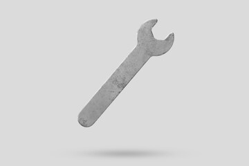 Wrench fly over gray background close up