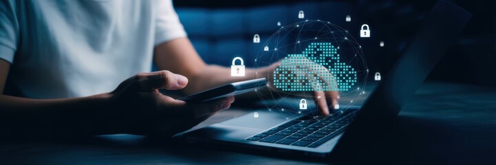 Person working on a laptop with a cloud security concept.