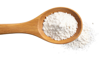 A Wooden spoon holding white flour, with some spilled.