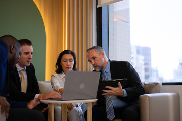 Group of white collar workers are working and meeting at office.