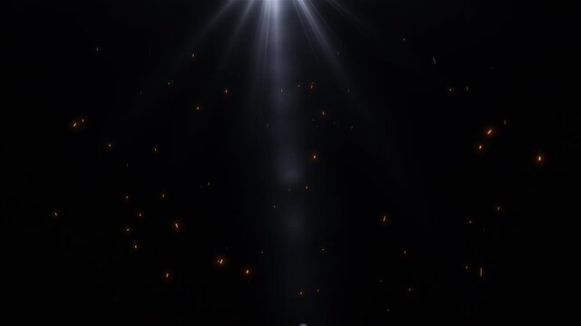 Light Rays With Sparkling Particles on a Black Background