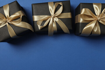 Bright Christmas decorations and gifts on a blue background