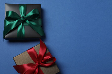 Bright Christmas decorations and gifts on a blue background