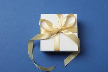 Bright Christmas decorations and gifts on a blue background