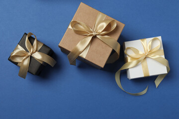 Bright Christmas decorations and gifts on a blue background