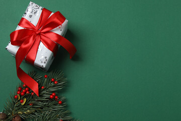 Bright Christmas decorations and gifts on classic green background
