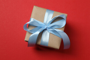 gift box with bow on red background
